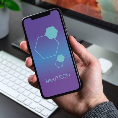 Man holding iPhone X